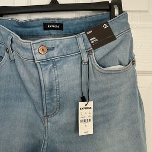 Curvy Mid Rise Light Wash Ripped Skinny Jeans